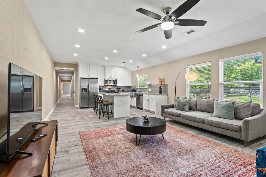 Open-concept living room and kitchen in a Sherman, Texas house